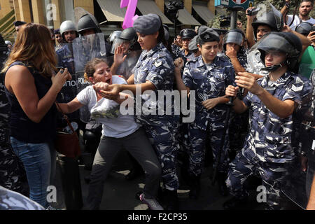 Beirut, Beirut, Lebanon. 16th Sep, 2015. Lebanese activists from 'You Stink' campaign clash with riot police after a protest against today s session of a dialogue of top political figures, accused by the group of failing to resolve a crisis over rubbish building up in the streets, in downtown Beirut on September 16, 2015 Credit:  Marwan Tahtah/APA Images/ZUMA Wire/Alamy Live News Stock Photo