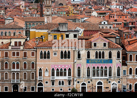 Charming traditional architecture and terracotta rooftops in the city of Venice, Italy Stock Photo