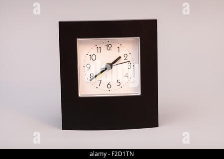 Alarm Clock on gray background Stock Photo