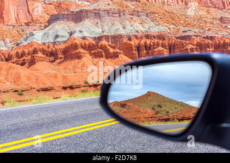 Road in a mirror, Capitol Reef National Park, USA. Stock Photo