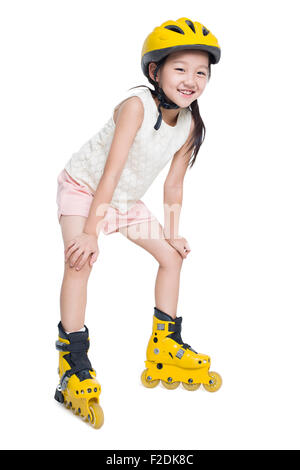 Little girl roller skating Stock Photo