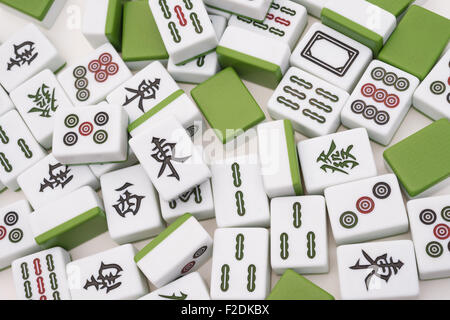 lots of mah jong bricks on white background,the Chinese on the bricks menas east, south, west, north, they refer to different di Stock Photo