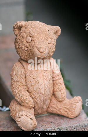 Red clay Teddy bear sculpture Stock Photo