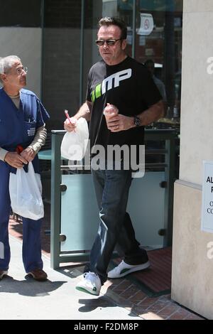 Tom Arnold seen leaving a cafe in Beverly Hills with a drink and some food to go.  Featuring: Tom Arnold Where: Los Angeles, California, United States When: 16 Jul 2015 Stock Photo