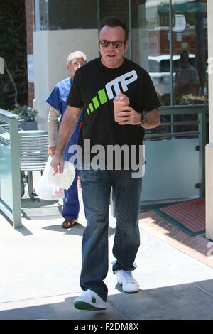 Tom Arnold seen leaving a cafe in Beverly Hills with a drink and some food to go.  Featuring: Tom Arnold Where: Los Angeles, California, United States When: 16 Jul 2015 Stock Photo