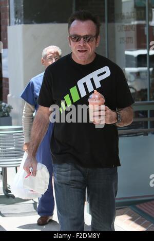 Tom Arnold seen leaving a cafe in Beverly Hills with a drink and some food to go.  Featuring: Tom Arnold Where: Los Angeles, California, United States When: 16 Jul 2015 Stock Photo