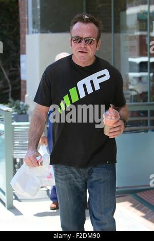 Tom Arnold seen leaving a cafe in Beverly Hills with a drink and some food to go.  Featuring: Tom Arnold Where: Los Angeles, California, United States When: 16 Jul 2015 Stock Photo