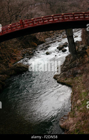 Red bridge over river in Nikko Japan Stock Photo