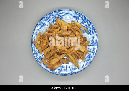 Crispy deep fried dried fish Stock Photo