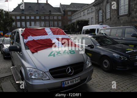 Copenhagen, Denmark. 16th September, 2015. Joachim B. Olsen Danish politician from Danish liberal alliance party talks to Danish taxi driver  protestor that Uber will be legal and healthy for innovation and competition for taxi branch. Stock Photo