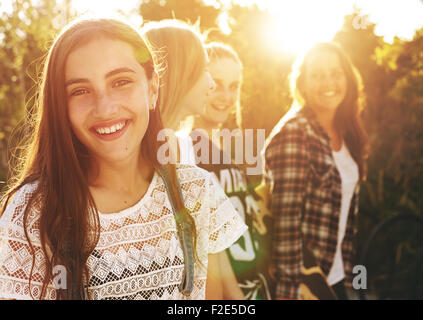 Portrait of group of friends, one smiling at camera Stock Photo