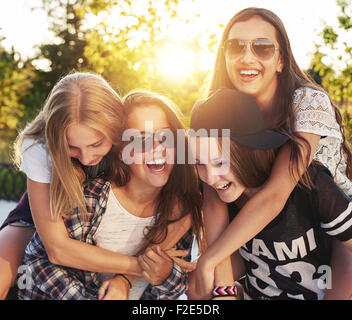 Group of friends laughing and having fun Stock Photo