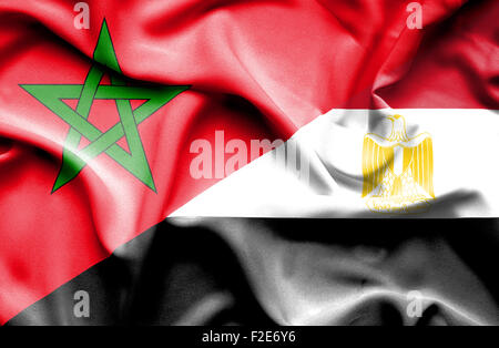 Waving flag of Egypt and Morocco Stock Photo