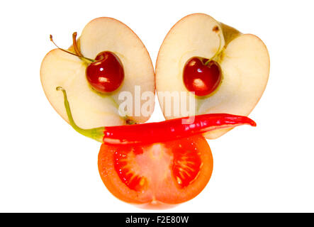 Gesicht/ face: Kirschen, Apfel, Tomate, Chilly - Symbolbild Nahrungsmittel. Stock Photo