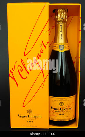 Tambov, Russian Federation - August 16, 2015 Bottle of Champagne Veuve Clicquot Brut in box on black background. Studio shot. Stock Photo