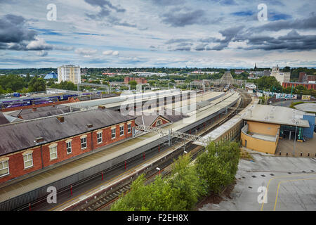 Stockport railway station , looking oiyt towards Manchester with the skyline visible on the horizon including Beetham tower and Stock Photo