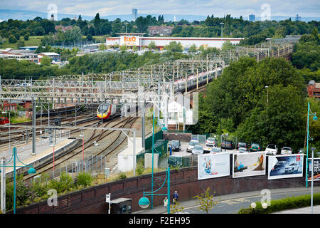 Stockport railway station , looking oiyt towards Manchester with the skyline visible on the horizon including Beetham tower and Stock Photo