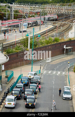 Stockport railway station , looking oiyt towards Manchester with the skyline visible on the horizon including Beetham tower and Stock Photo