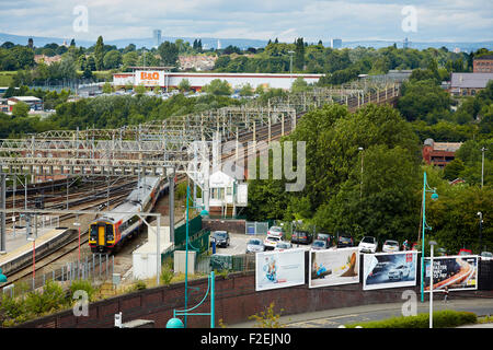 Stockport railway station , looking oiyt towards Manchester with the skyline visible on the horizon including Beetham tower and Stock Photo