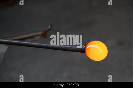 Handcrafted of glass blowing. Ancient craft for production of of glassware. Stock Photo