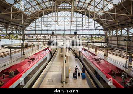 Manchester Piccadilly railway station   Manchester Piccadilly is the principal railway station in Manchester, England. Opened as Stock Photo