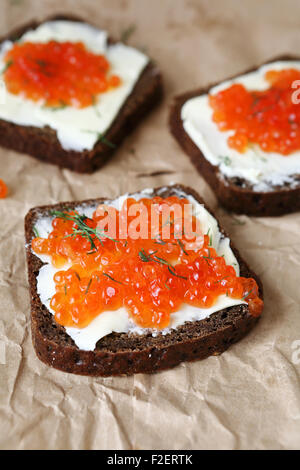 Three slices of bread with butter and caviar, food Stock Photo