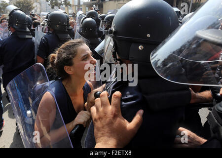 Beirut, Lebanon. 16th Sep, 2015. A Lebanese activist from 'You Stink' campaign shouts slogans in front of riot police during a protest against today s session of a dialogue of top political figures, accused by the group of failing to resolve a crisis over rubbish building up in the streets, in downtown Beirut. © Marwan Tahtah/APA Images/ZUMA Wire/Alamy Live News Stock Photo