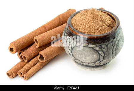 cinnamon sticks with powder isolated on the white background. Stock Photo
