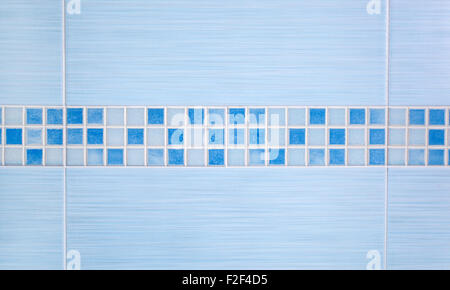 Blue tiles with row mosaic assembled on the bathroom wall Stock Photo