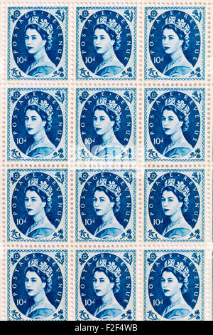 Sheet of 1950's British Royal Mail 10d blue postage stamps from the Wildings definitive issue with portrait of Queen Elizabeth II. Stock Photo