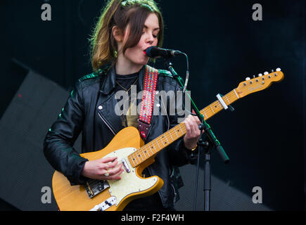 Stina Marie Claire Tweeddale of Honeyblood at Victorious Festival 2015, singing. Stock Photo
