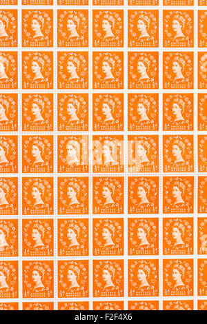 Sheet of 1950's British Royal Mail ½d orange postage stamps from the Wildings definitive issue with portrait of Queen Elizabeth II. Stock Photo