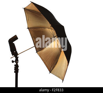 Light stand with flash and umbrella Stock Photo