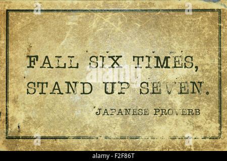 FALL SEVEN TIMES STAND UP EIGHT, words written on red rectangle 