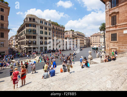 Tourists sitting down on and walking up The Spanish Steps Piazza di spagna Roma Rome lazio Italy EU Europe Stock Photo