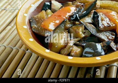 Di san xian -  Chinese dish made of stir-fried potatoes, aubergine (egg-plant) and sweet peppers Stock Photo