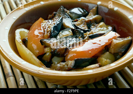 Di san xian -  Chinese dish made of stir-fried potatoes, aubergine (egg-plant) and sweet peppers Stock Photo