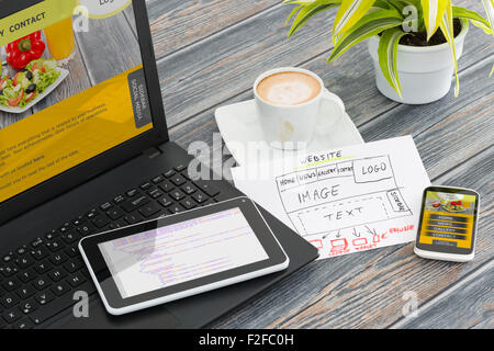 Designer's desk with responsive web design concept. Stock Photo