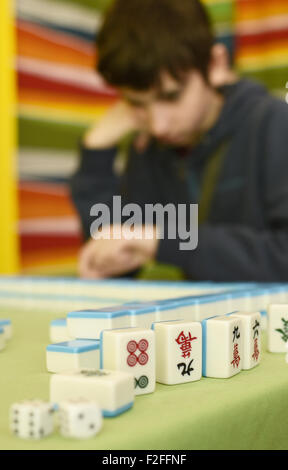 Tiles of mahjong board game Stock Photo