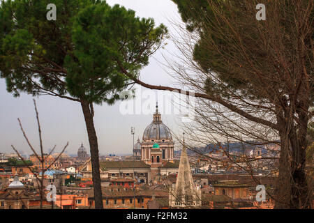 View of San Marcello al Corso church and Rome roofs from Pincio
