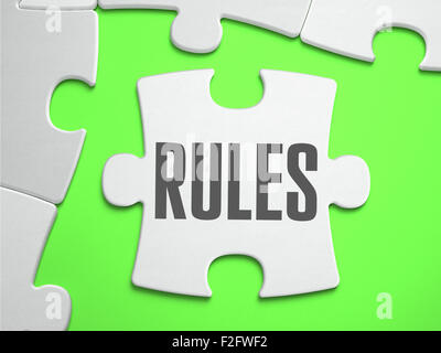 Rules - Jigsaw Puzzle with Missing Pieces. Bright Green Background. Close-up. 3d Illustration. Stock Photo