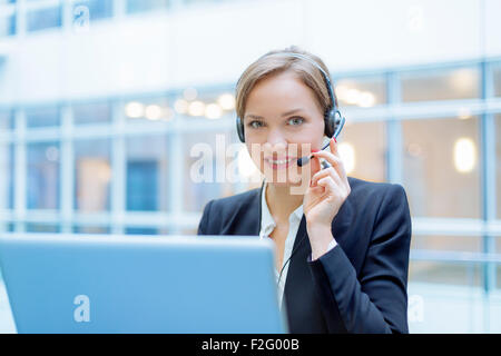 Operator talking on microphone Stock Photo