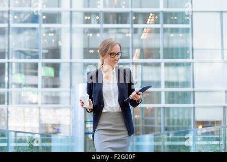 Businesswoman having a coffee break Stock Photo