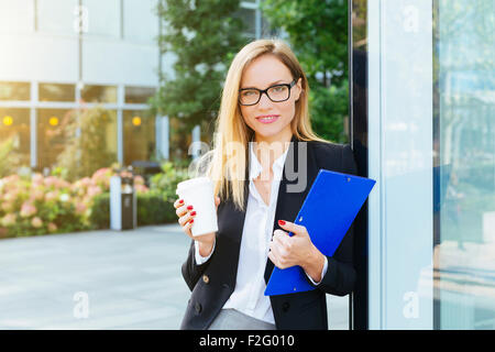 Businesswoman having a coffee break Stock Photo