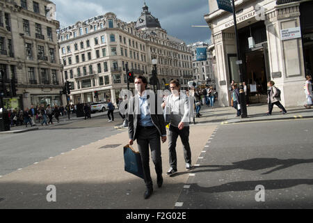 Shoppers on Regent Street, one of the main shopping streets in the West End of London. UK Stock Photo