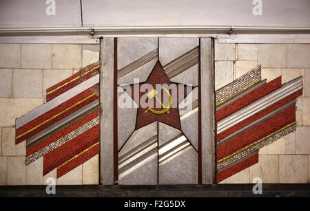 Red star sickle and hammermosaic in the metro of Kiev metro Stock Photo