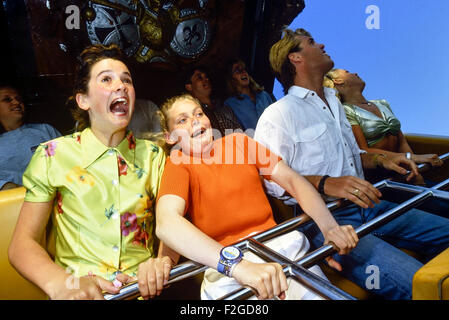 Young people on a fairground ride at Bottom' Pleasure Beach. Skegness. England. UK Stock Photo
