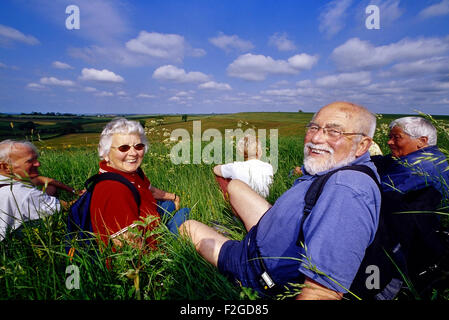 Hikers taking a break along the Lincolnshire Wolds. Lincs. England. UK Stock Photo