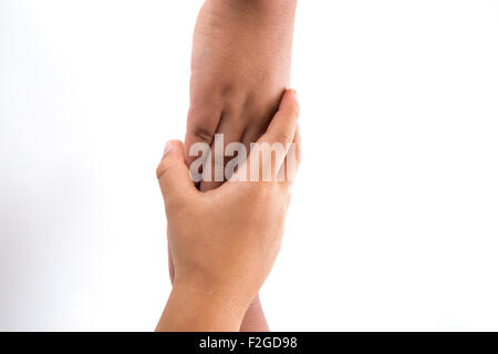 Children holding hands - handshake on white background. Stock Photo