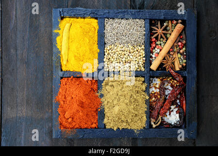 Indian spices on wooden background Stock Photo